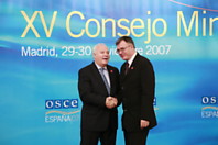 OSCE Chairman-in-Office, Spanish Foreign Minister Miguel Angel Moratinos (left), welcomes Lithuanian Foreign Minister Petras Vaitiekūnas at the 15th OSCE Ministerial Council in Madrid, 29 November 2007